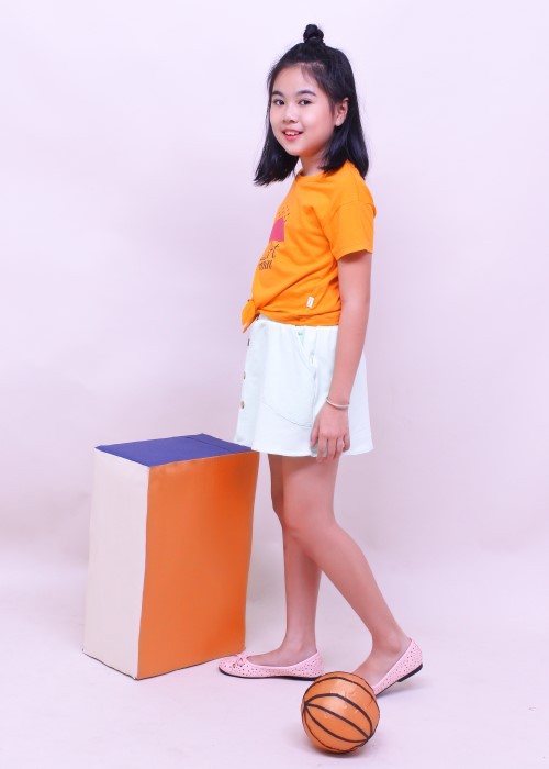 Chân váy bé gái nút gỗ xanh ngọc Jadiny
