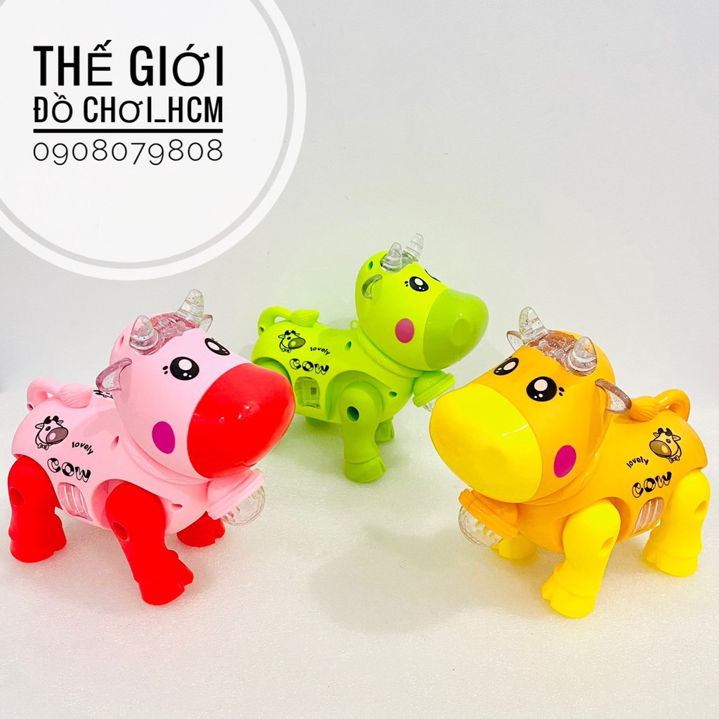 Đồ chơi bò chạy pin có đèn nhạc có dây cho bé dắt đi dạo.