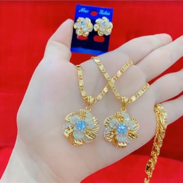 Dây chuyền nữ mặt hoa mai vàng và bông tai cùng bộ ảnh thật