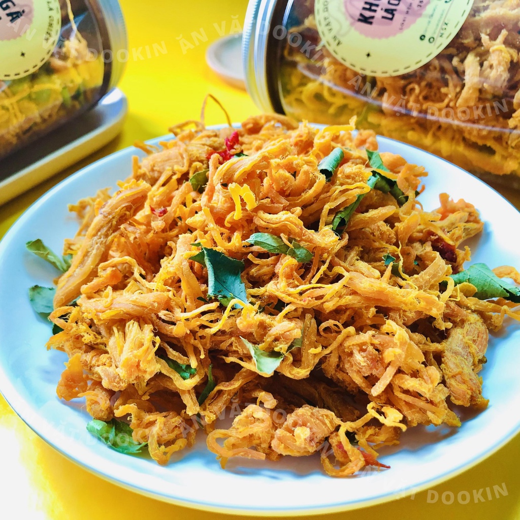 Khô gà lá chanh mềm cay 250g DooKin đồ ăn vặt vừa ngon vừa rẻ | BigBuy360 - bigbuy360.vn