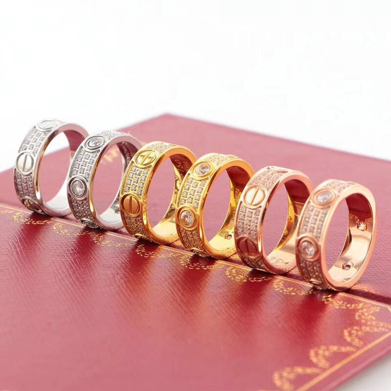 Nhẫn Đôi Bằng Thép Không Gỉ Mạ Vàng 18K Đính Đá Thời Trang