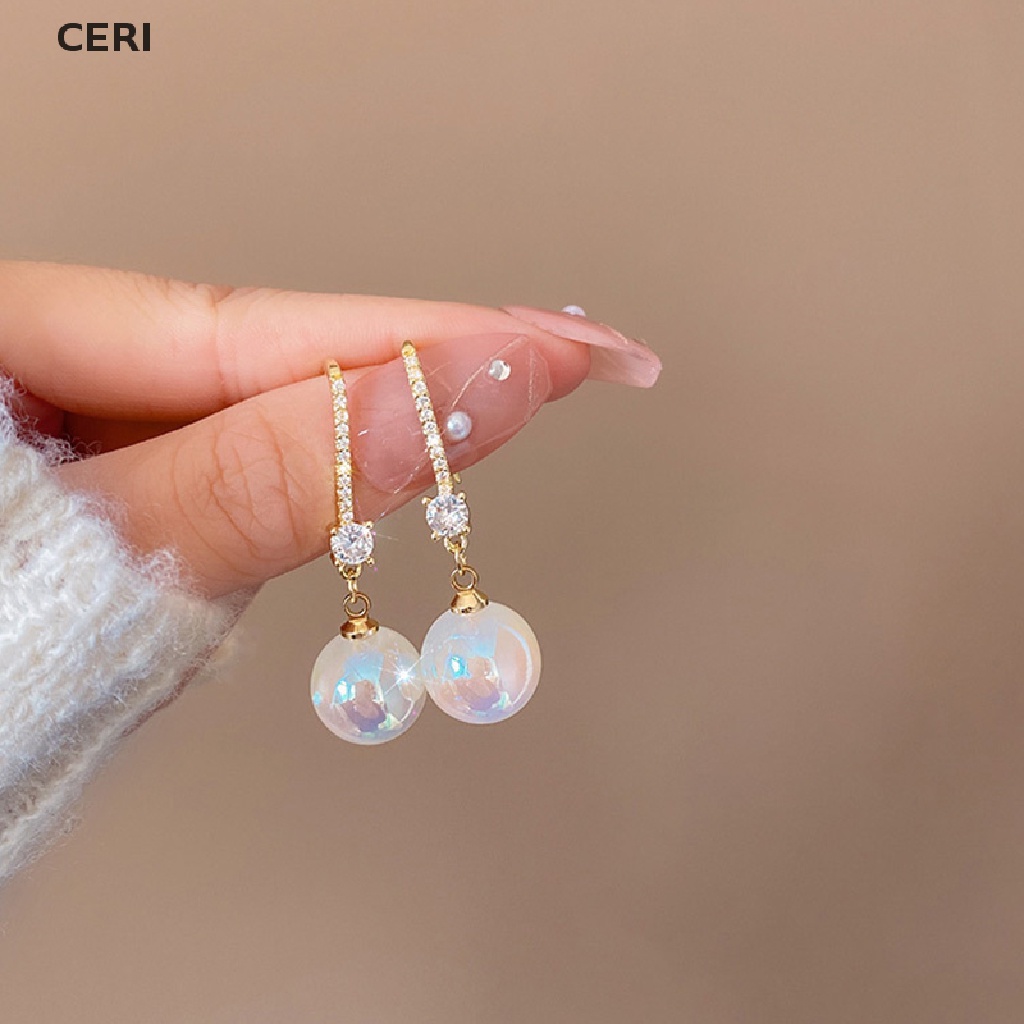 Khuyên Tai Dáng Dài Đính Hạt Ngọc Trai Vàng Phong Cách Nổi Tiếng Đơn Giản Thời Trang