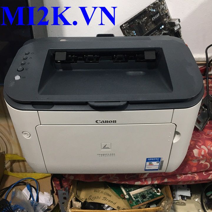 Máy In Văn Phòng 2 Mặt qua mạng Lan Tốc Độ Cao -Canon 6230DN (Tặng Hộp Mực Đa Năng - Dây Nguồn , Cáp in Mới Đi Theo Máy)
