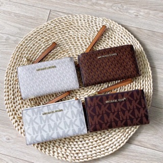 Ví cầm tay Michael Kors - gập