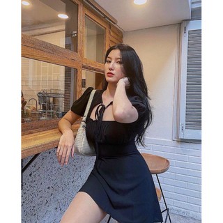 đầm khoét ngực đen trắng