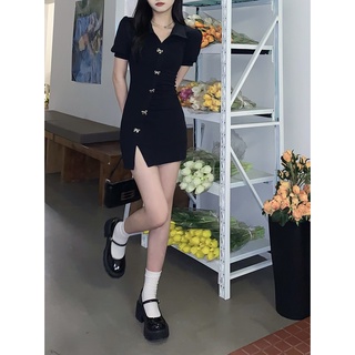 Váy ôm đen đính nơ nổi