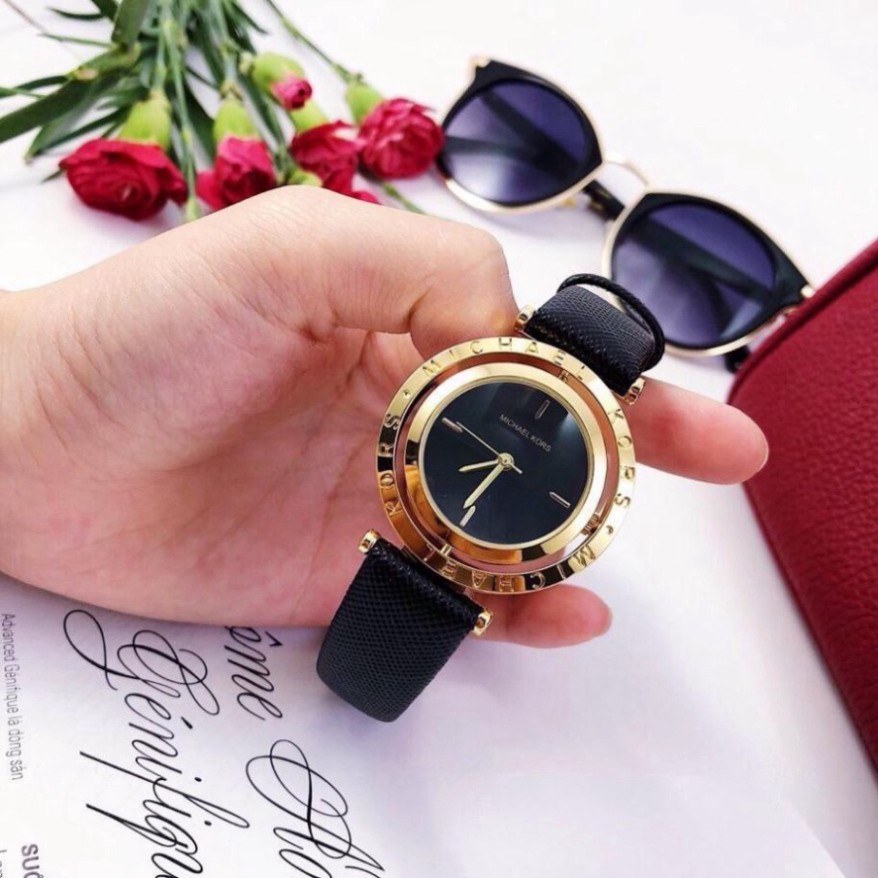 Đồng hồ nữ Michael Kors Dây da mặt xoay độc đáo