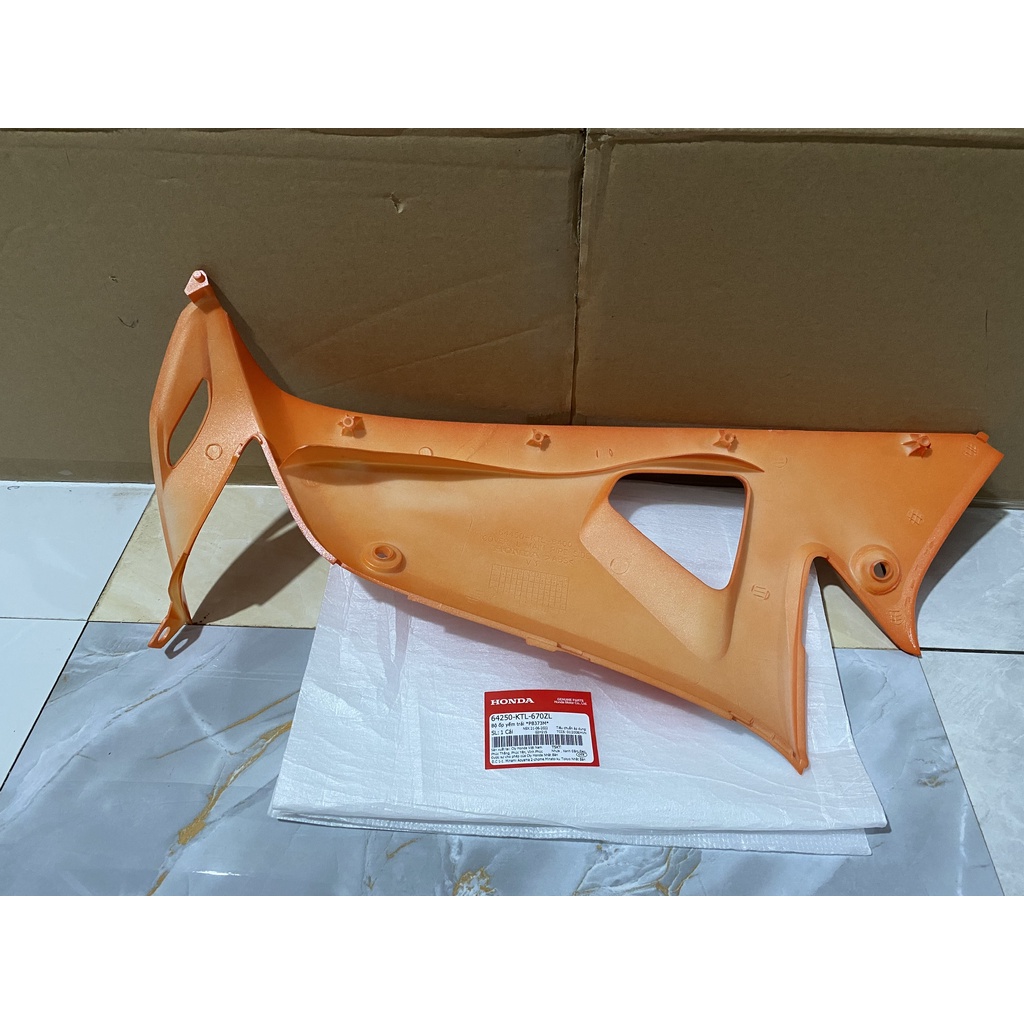 Bộ ốp yếm bên trái HONDA WAVE RS100 REPSOL năm 2006 màu Cam.
