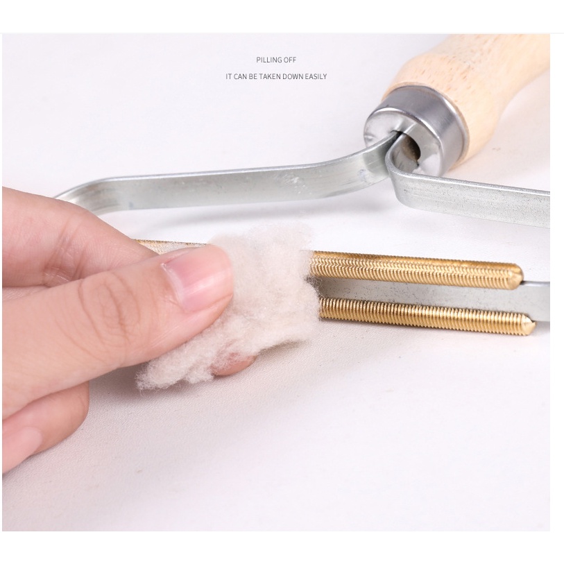 Dụng cụ loại bỏ lông xù trên quần áo tiện lợi