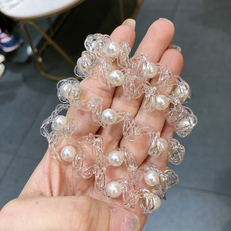 Dây cột tóc lò xo thời trang đơn giản tiện lợi cho nữ