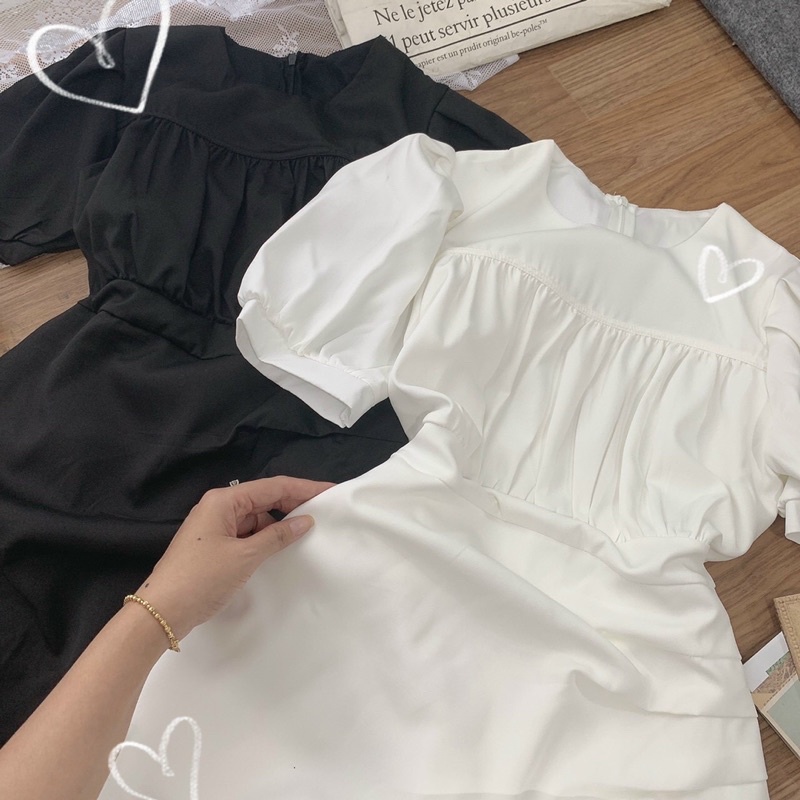 Đầm đen tay phồng vạt chéo