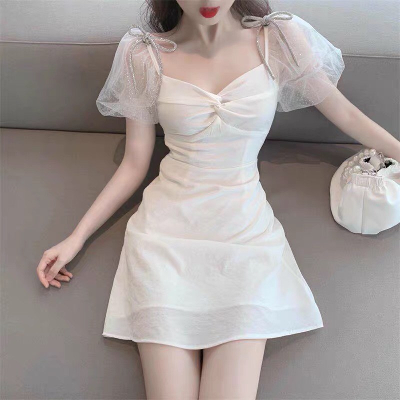 (order) Váy trắng nữ tay bồng xoắn nơ đẹp- Quảng châu