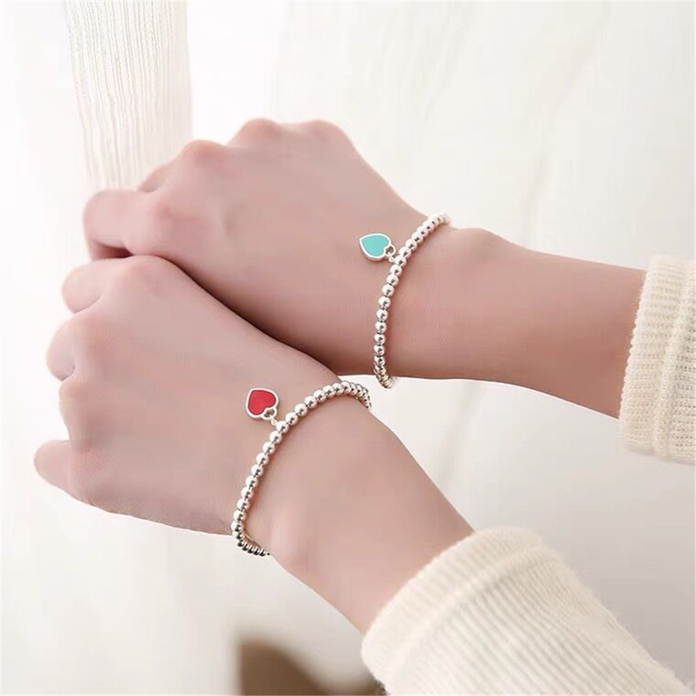 1 vòng tay chuỗi hạt hình trái tim ba màu sắc thời trang cho nữ