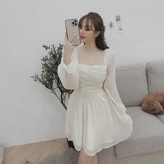 Đầm xòe phối nút