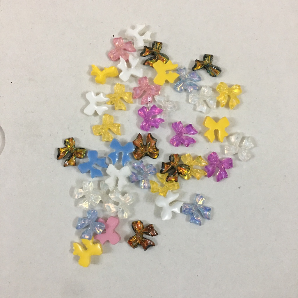 Set charm nơ xinh làm nail