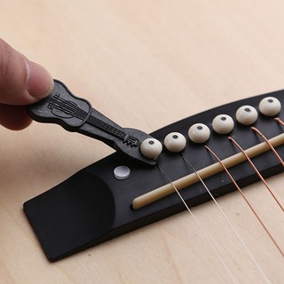 Dụng cụ nhổ chốt dây đàn ghita