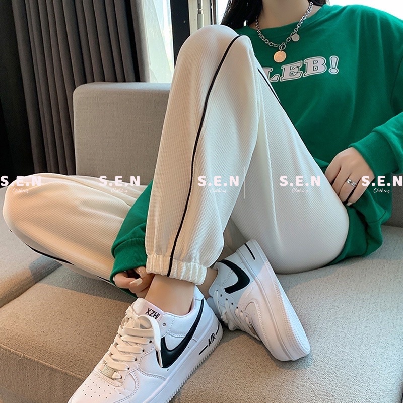 Quần tổ ong ống rộng bo gấu hoạ tiết sọc 2 bên