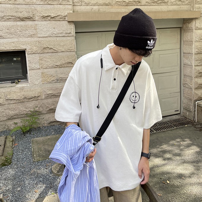 Áo thun polo ngắn tay dáng rộng in hình mặt cười phong cách Hàn Quốc cho nam và nữ