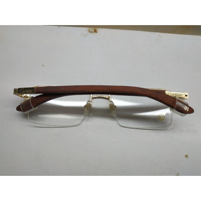 Gọng kính cartier càng gỗ