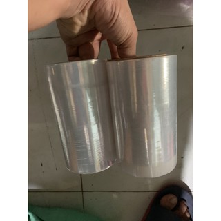 Màng quấn pe15cm-600gram- cuộn pe quấn chít hàng hóa va li palet