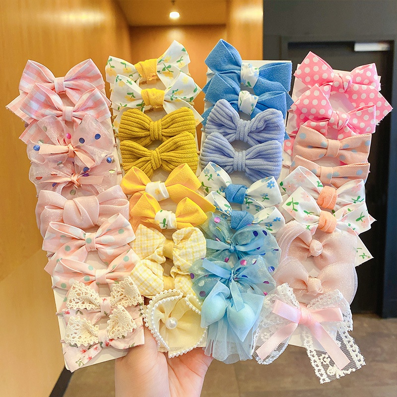 Set 10 Dây Cột Tóc Co Giãn Đính Nơ Hoạt Hình Dễ Thương Cho Bé Gái