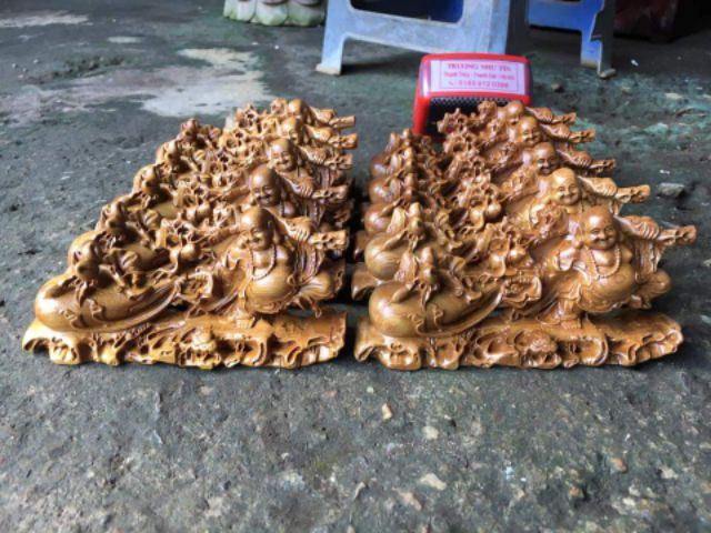 Tượng phật di lặc kéo bao gỗ thơm [ngang 40cm]