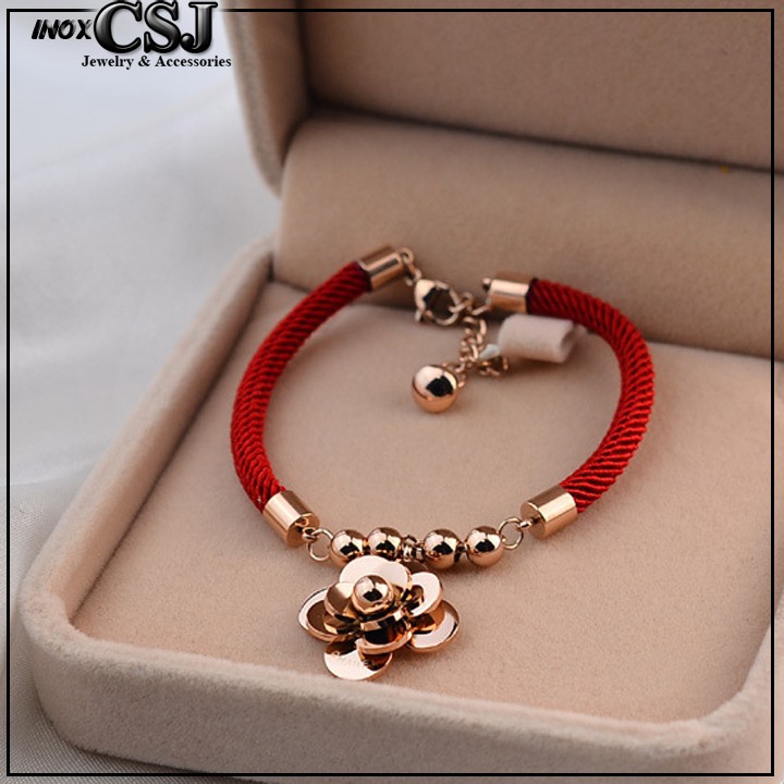 LẮC TAY NỮ TITAN CHỈ ĐỎ HOA TRÀ MÀU VÀNG HỒNG