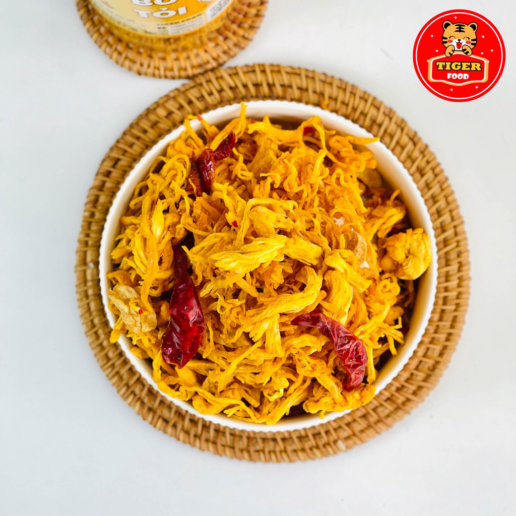Khô Gà Bơ Tỏi Xé Cay TIGER FOOD Khô Gà Bơ Tỏi Đậm Vị Siêu Ngon Lon 300g - Đồ Ăn Vặt Sài Gòn
