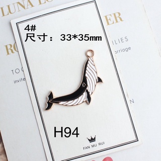 Charm kim loại hình cá heo