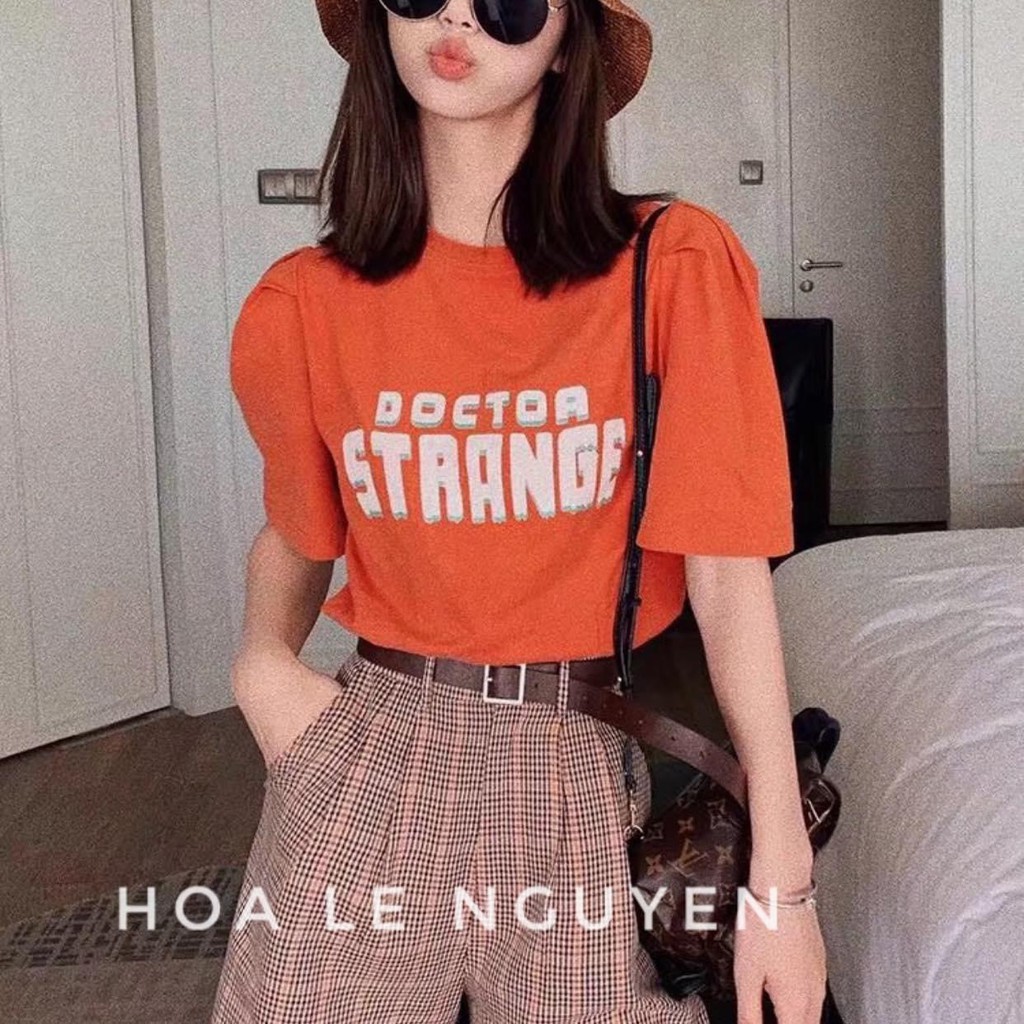 SỈ BỘ NGỐ ÁO CAM QUẦN KẺ