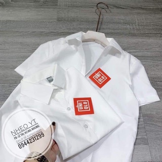 ÁO SƠ MI TRẮNG CỘC TAY .