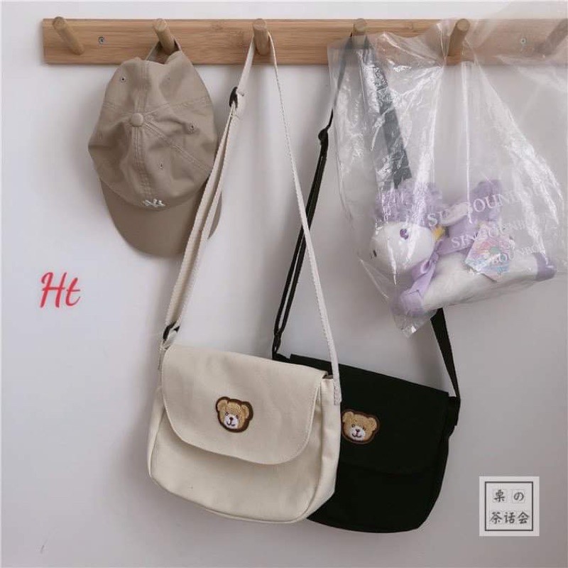 Túi khuy lô gô nắp gấu HT12