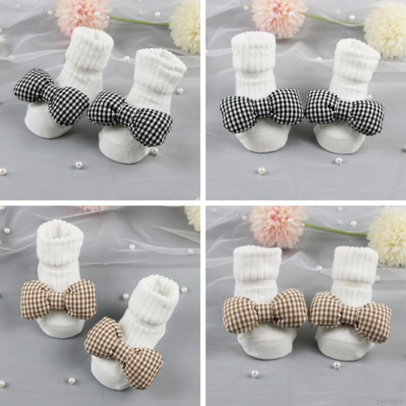Đôi vớ cotton họa tiết caro đính nơ dễ thương dành cho bé
