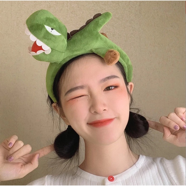 CÀI TÓC KHỦNG LONG XANH