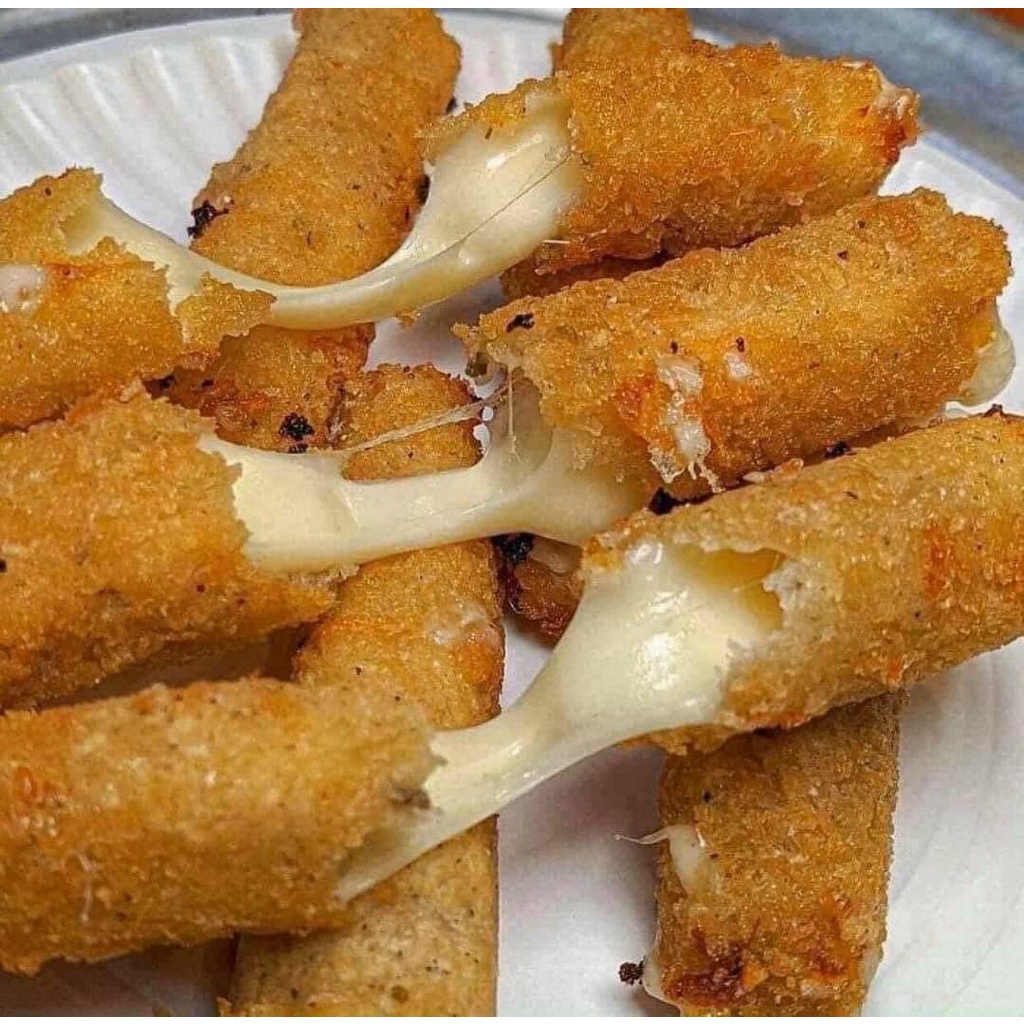 Phô mai que kéo sợi, ngon hơn khi còn nóng. Cây phô mai kéo sợi thơm ngon.