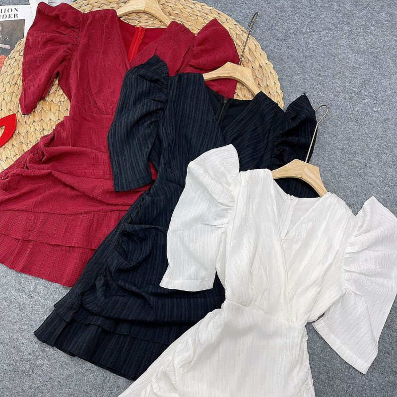 Đầm cổ tim tay phồng đắp chéo.