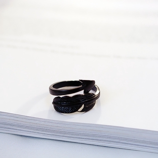 Adjustable ring with arrow opening