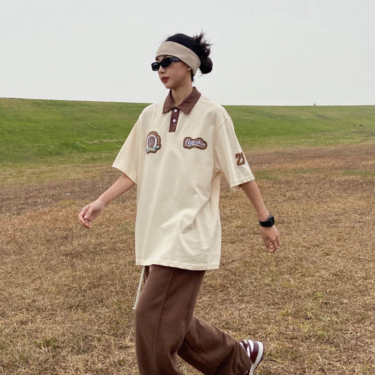 Áo polo Ngắn Tay Dáng Rộng Cổ Đứng Thêu Họa Tiết Đơn Giản Theo Phong Cách Retro Dành Cho Nữ