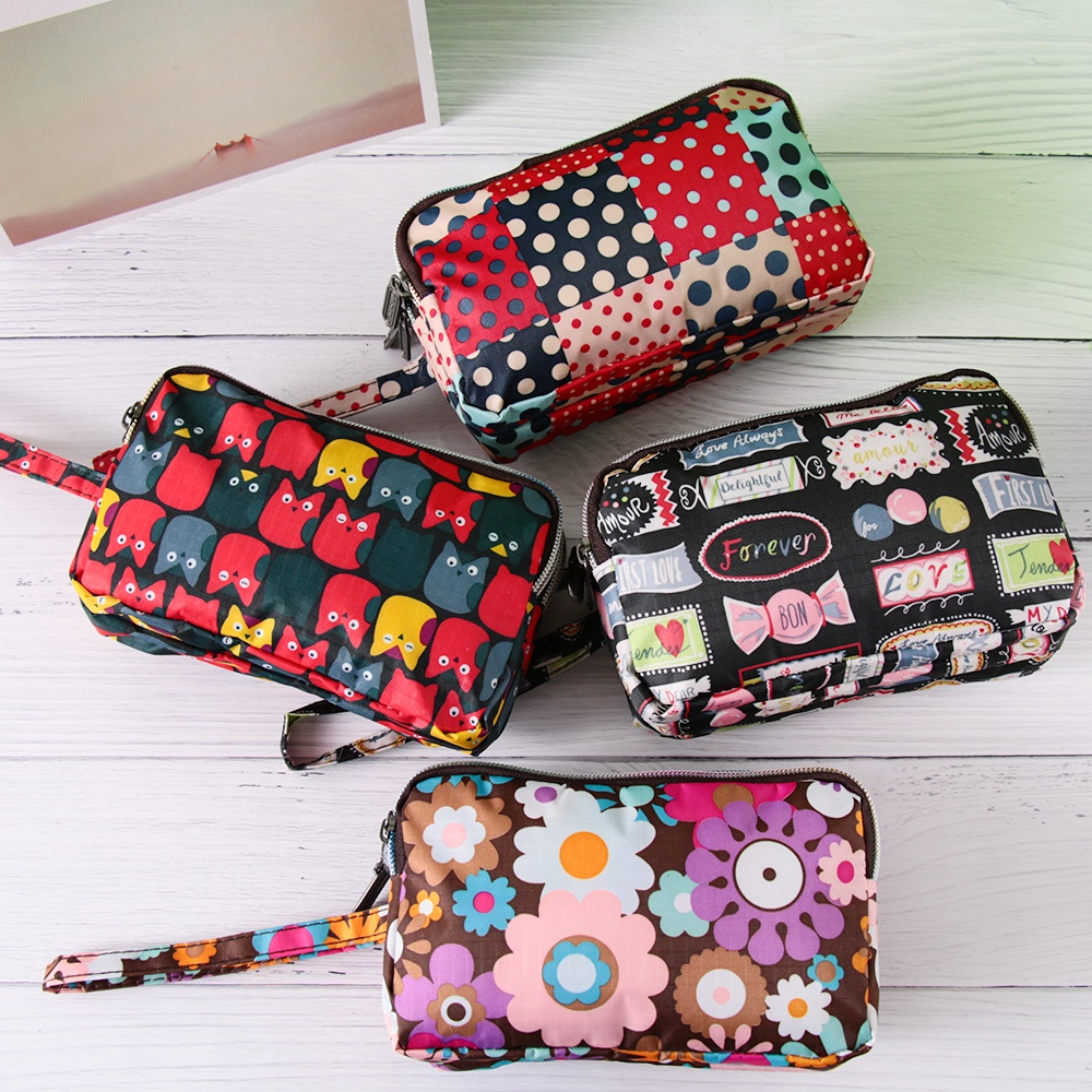 Ví đựng tiền xu / điện thoại / đồ trang điểm mini Daphne bằng vải bạt chống nước in hoa thời trang cho nữ