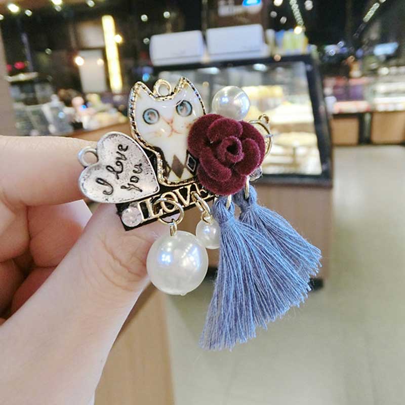 Ghim cài áo 5 đầu hoa trà đính ngọc trai sang trọng