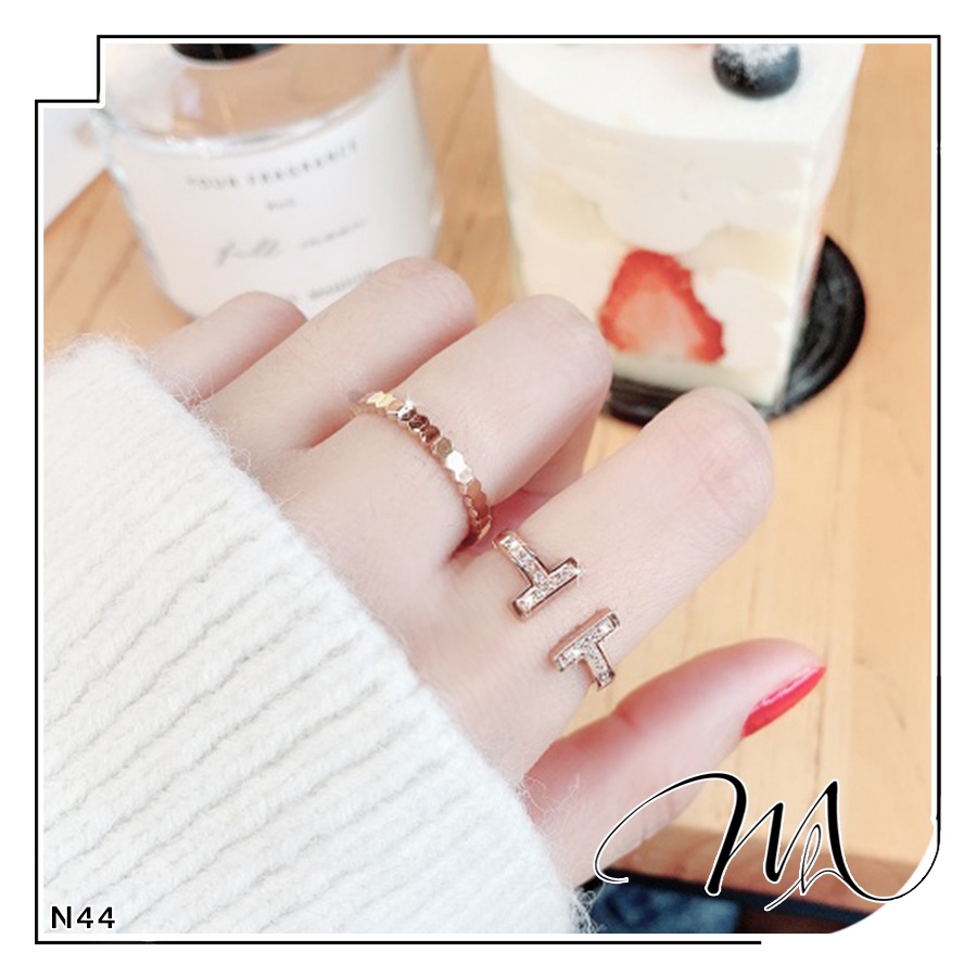 Nhẫn nữ Titan freesize chữ T đính đá phối xà cừ - Măng’s House N44