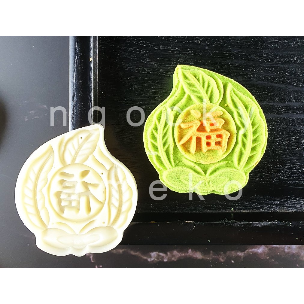 NQ50-024- KHUÔN LÒ XO BÁNH TRUNG THU / BÁNH DỨA  HÌNH QUẢ ĐÀO 50G