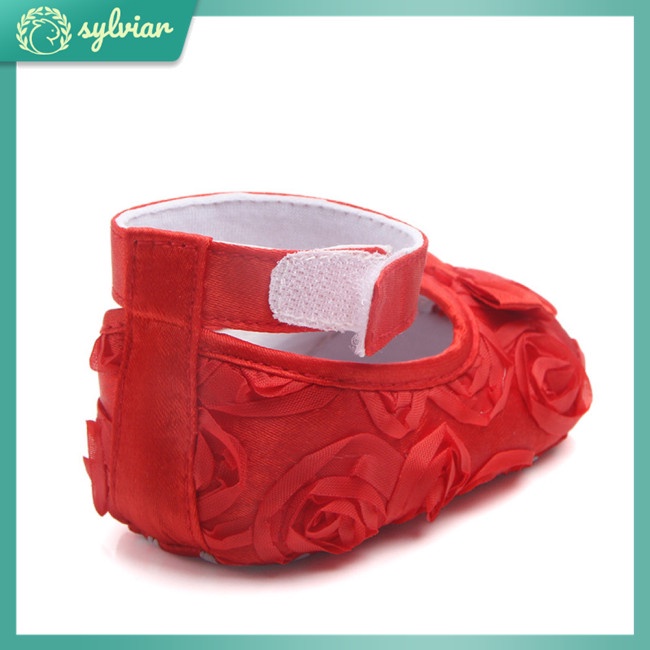 Đôi giày công chúa bằng vải lụa màu trơn đính hoa hồng cho bé 0-18 tháng tuổi