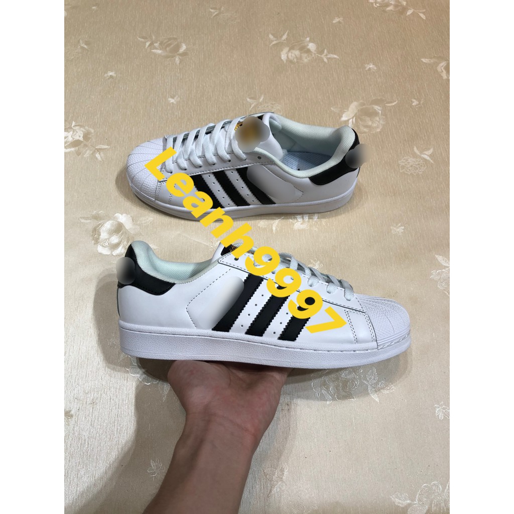 Giày thể thao sneaker kẻ đen