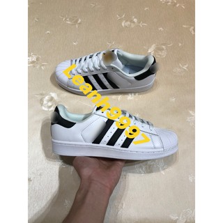 Giày thể thao sneaker kẻ đen