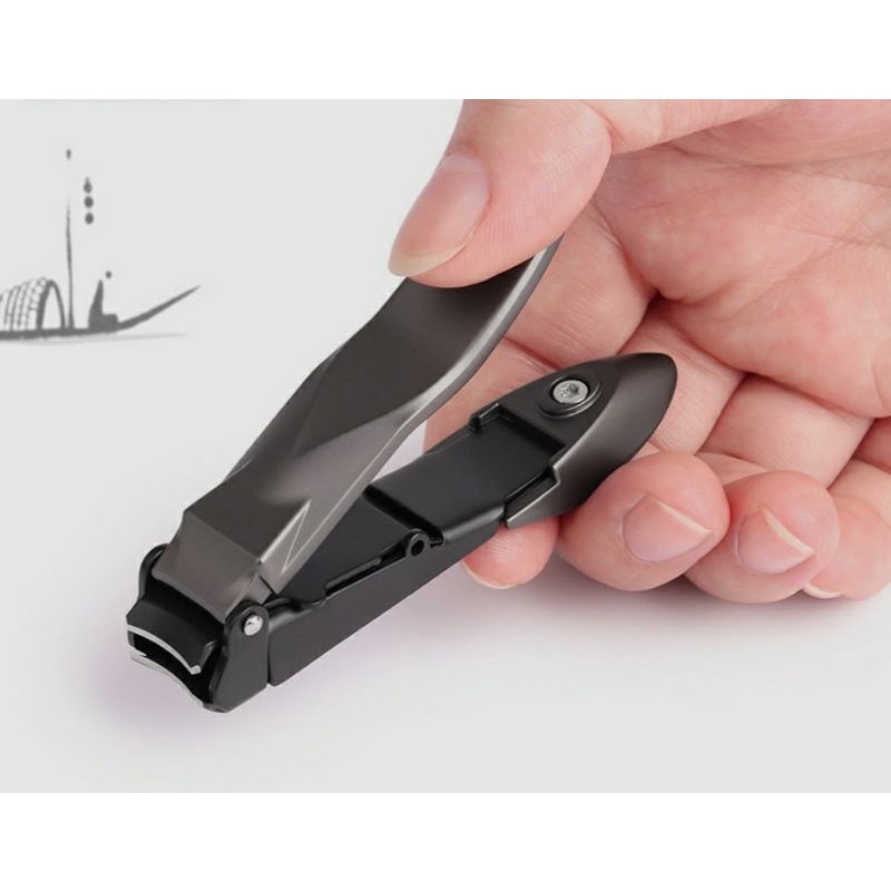 Bấm móng tay nguyên khối thép không gỉ có ngăn đựng móng và hộp