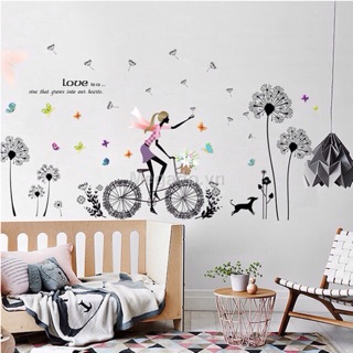 Decal dán tường hoa bồ công anh và cô gái đạp xe đạp
