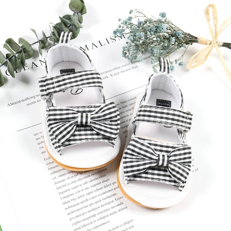 Giày sandal cotton thắt nơ chống trượt cho bé gái