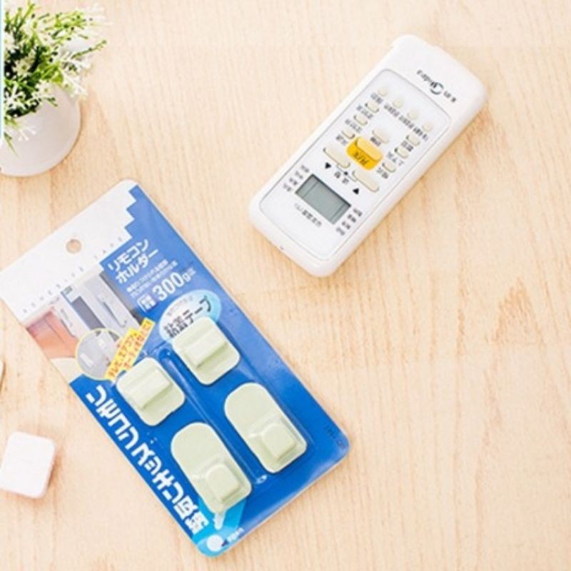 móc dán tường gắn remote
