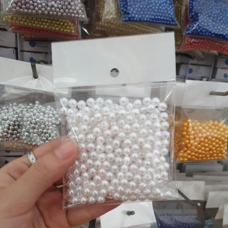 Hạt nhựa xỏ lỗ, size 6li